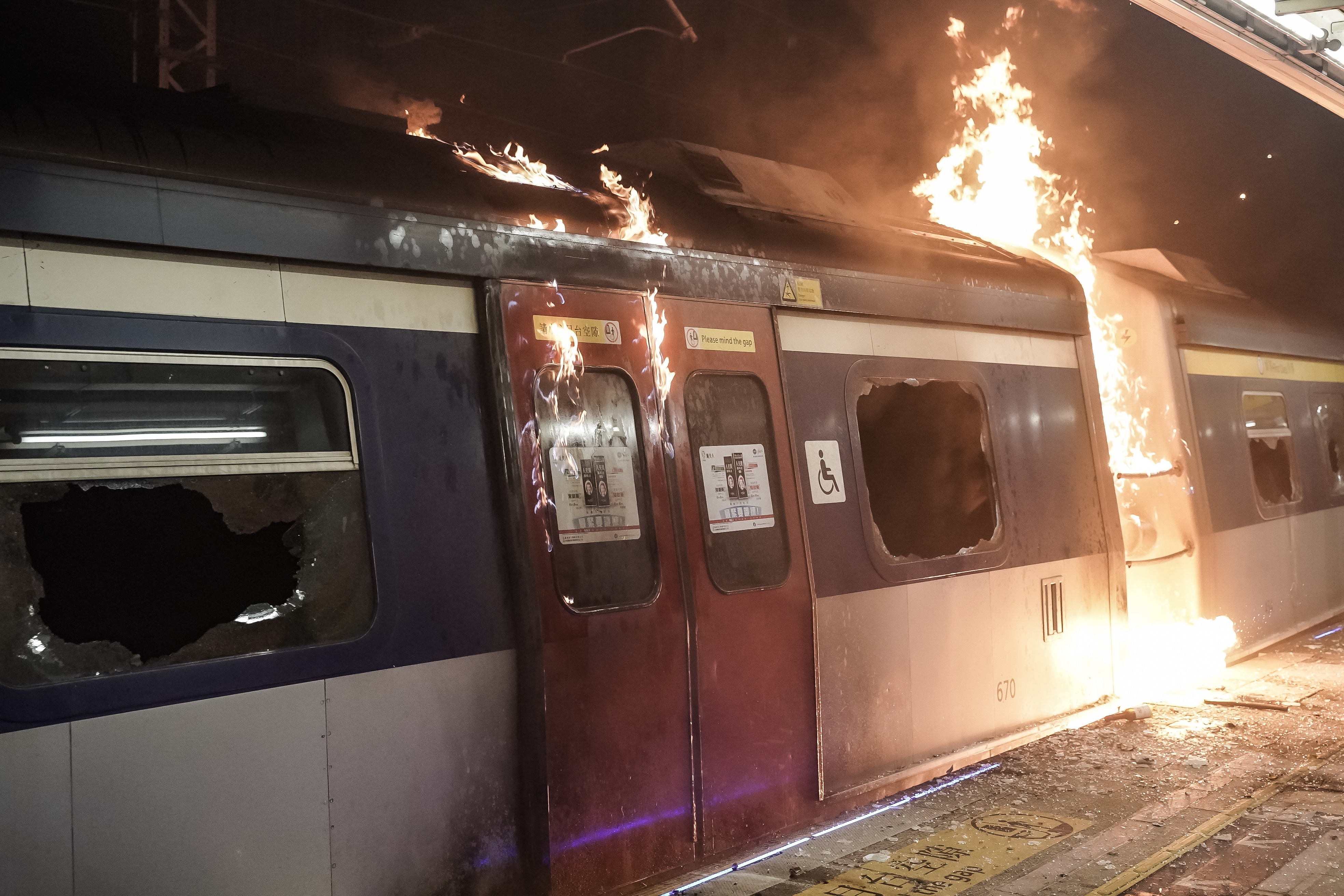 A train car burns at a MTR station during a demonstration at Chinese University of Hong Kong on November 13, 2019 in Hong Kong, China.