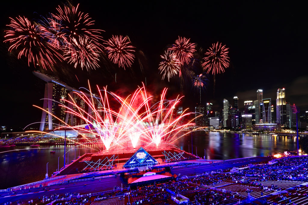 Singapore awaits 2020 with curtain-raiser fireworks by Star Island as revellers join in the biggest countdown celebration at Marina Bay on December 31, 2019 in Singapore.