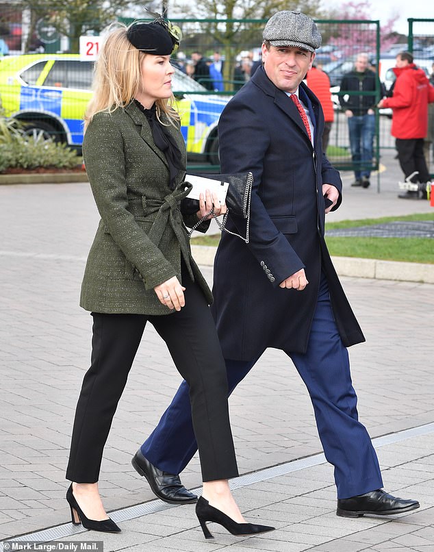 Still civil: The estranged royal couple put on a united front as they arrived together side by side for day one of the Cheltenham Festival